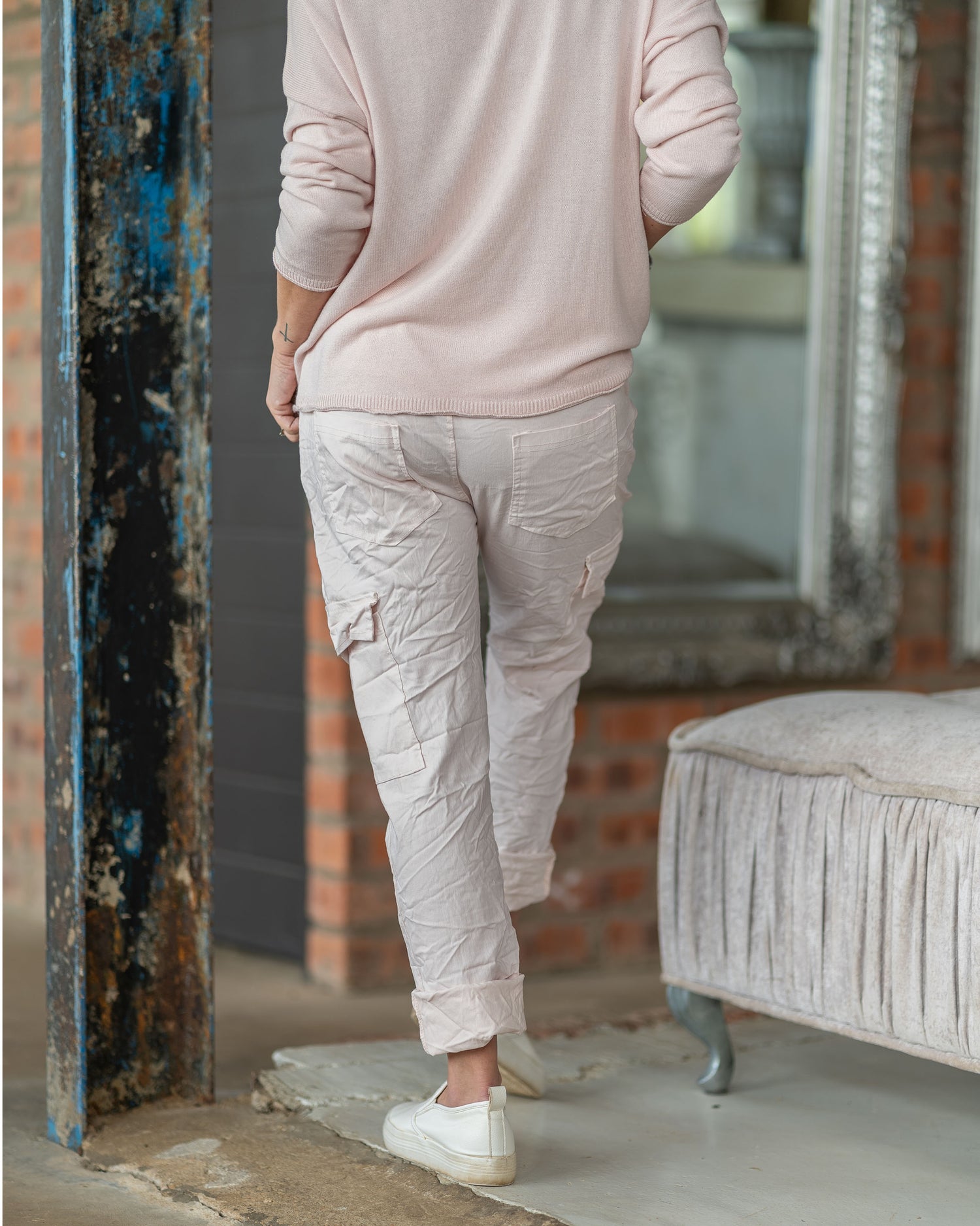 There is nothing "plain" about these pants - our elasticated drawstring pants with a button-up feature. Deep side pockets for practicality, these pants strike the perfect balance between style and functionality. The adjustable drawstring waist ensures a personalized fit, while the classic silhouette offers versatility for any occasion